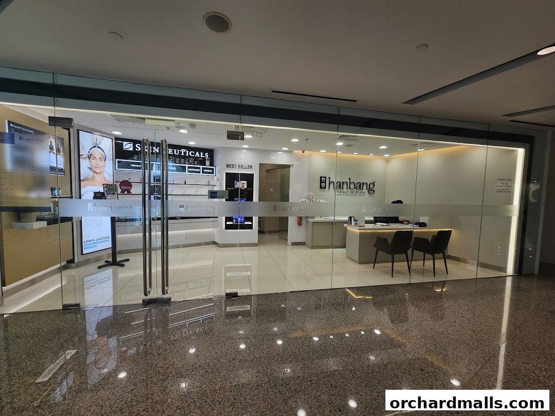 The exterior of Hanbang Skin Solutions, a modern skincare shop with glass doors and displays.