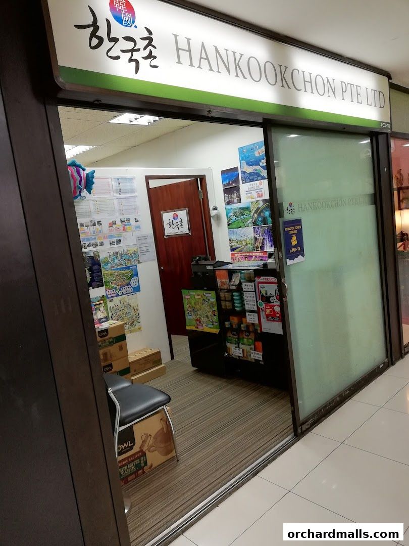 Entrance to Hankookchon Pte. Ltd. shop, displaying Korean products and travel information.