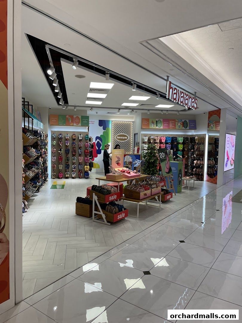 Interior view of a Havaianas store showcasing a wide variety of flip-flops and sandals.