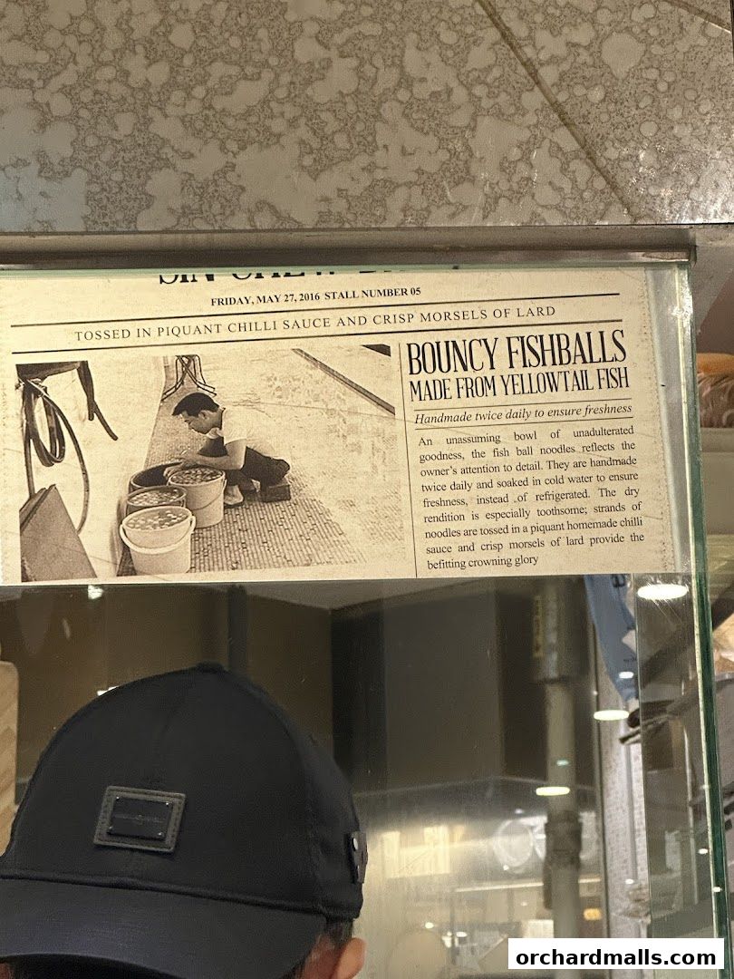 A newspaper clipping about bouncy fishballs made from yellowtail fish.