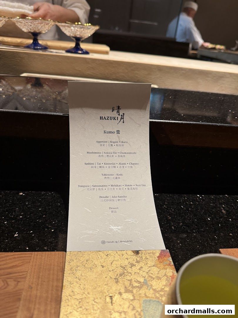 A menu for Hazuki restaurant, featuring Japanese dishes like sashimi, tempura, and dessert.