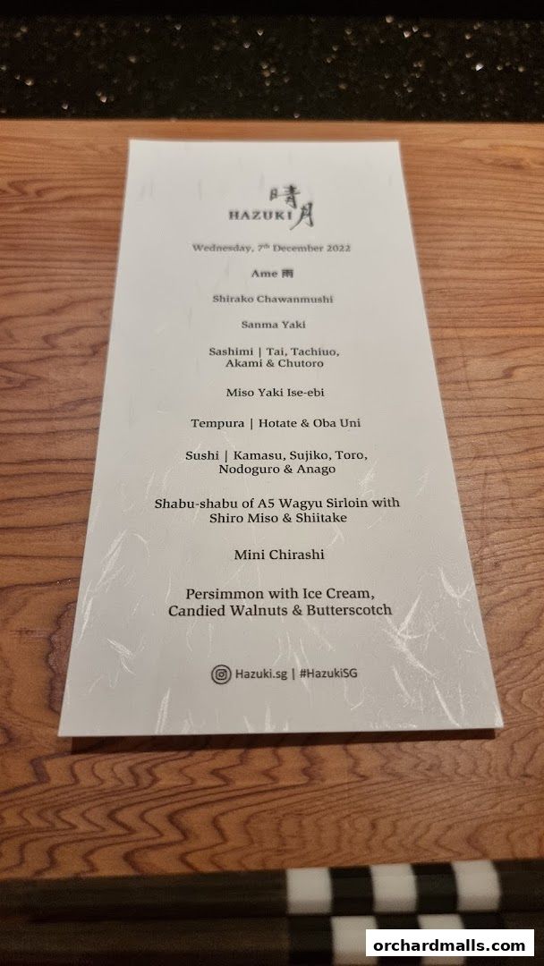 A menu from Hazuki restaurant featuring Japanese dishes and a dessert.