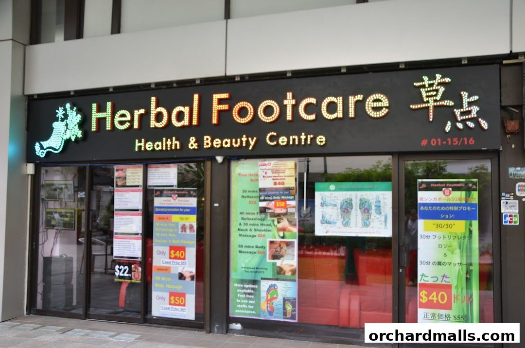 The storefront of Herbal Footcare, a health and beauty center offering various foot and body massages.