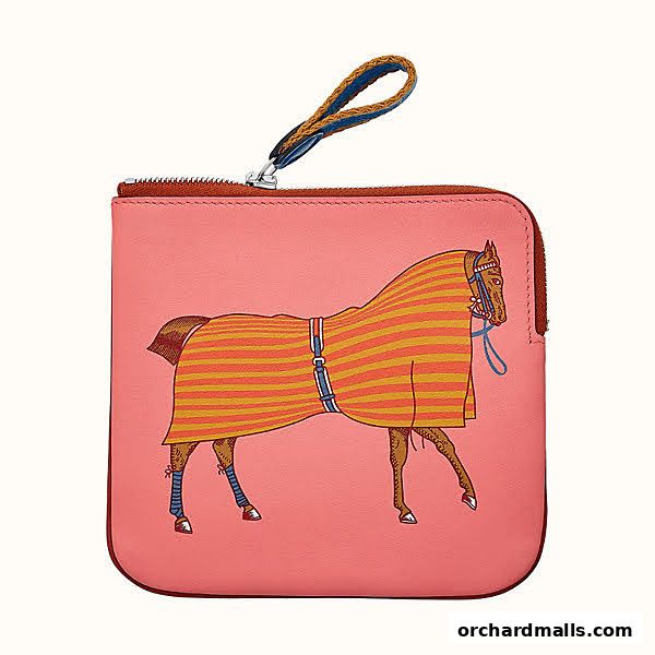 A pink pouch with a horse illustration and a braided handle.