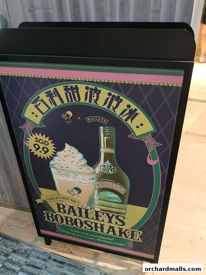 A sign advertising a Baileys Boboshake drink from HEYTEA, priced at SGD 9.9.