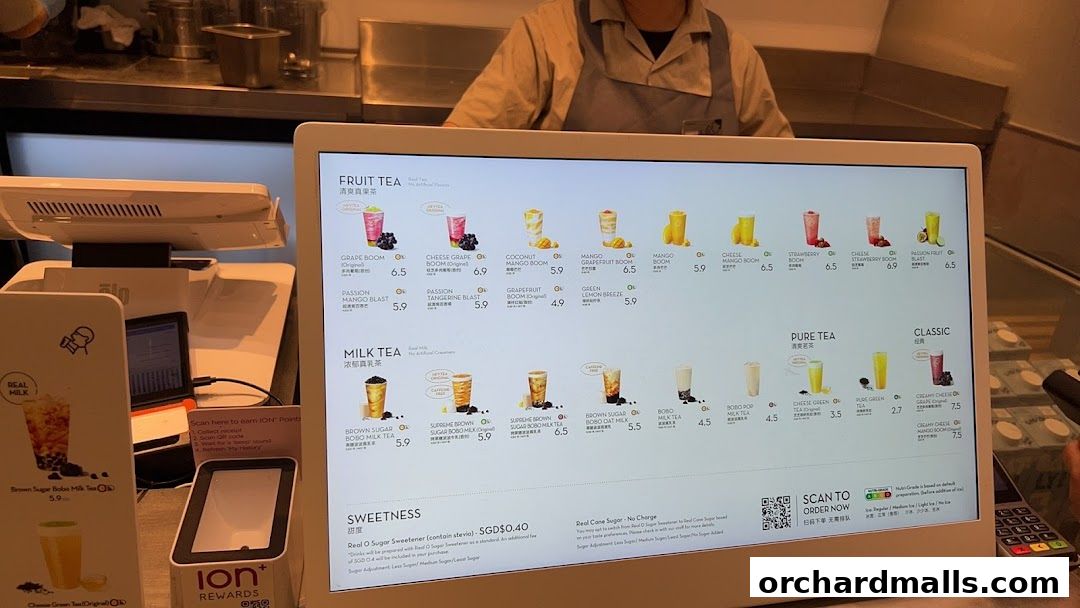 A digital menu displaying various fruit teas, milk teas, and classic teas with prices.