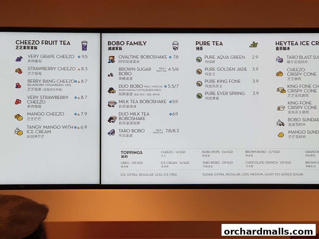 A menu displaying various fruit teas, milk teas, and ice cream drinks with prices.