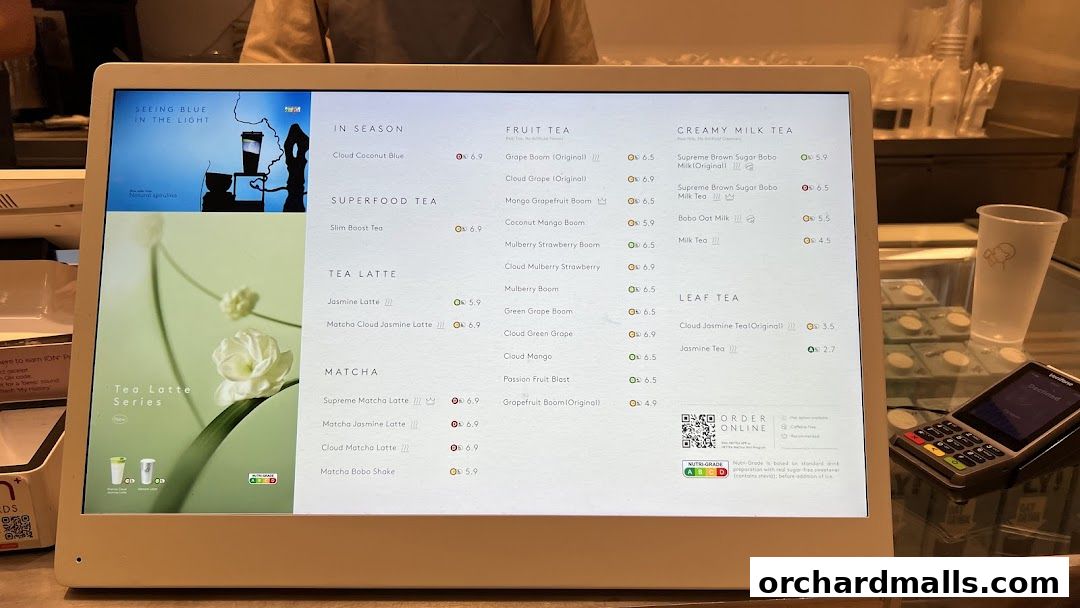 A digital menu displaying various tea options and prices at HEYTEA.