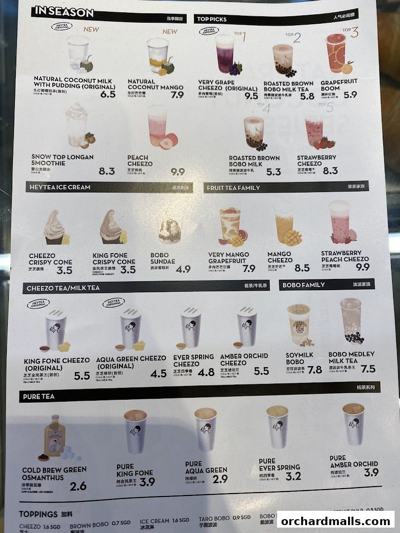 A menu from HEYTEA featuring various fruit teas, milk teas, ice cream, and toppings.