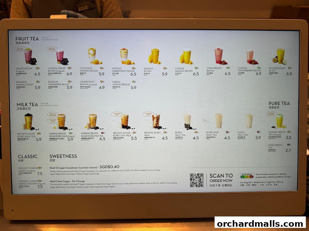 A digital menu displaying various fruit teas, milk teas, and pure teas with images and prices.