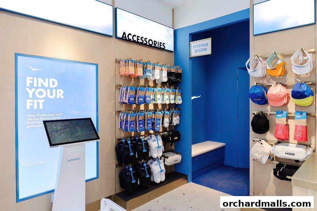 Interior of a HOKA store showcasing accessories, a fitting room, and a fitting technology kiosk.