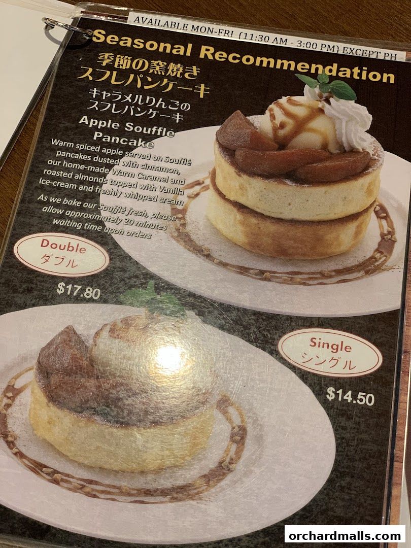 A menu featuring Apple Soufflé Pancakes with caramel apple and vanilla ice cream.