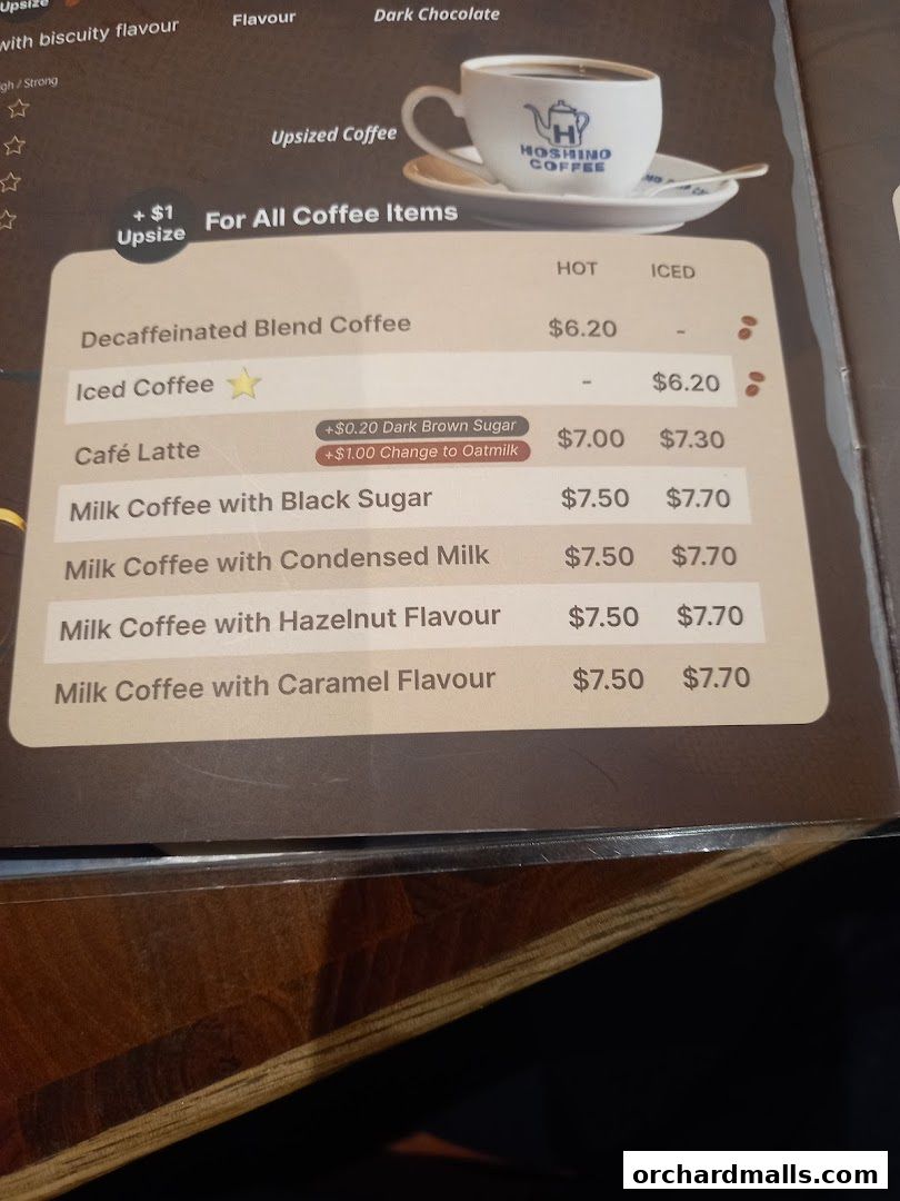 A menu featuring various coffee drinks with prices for hot and iced options.