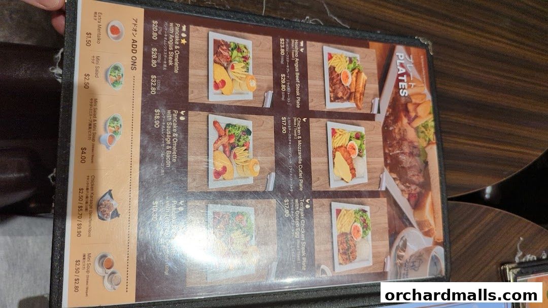 A menu from Hoshino Coffee featuring various plates and add-ons with food images.