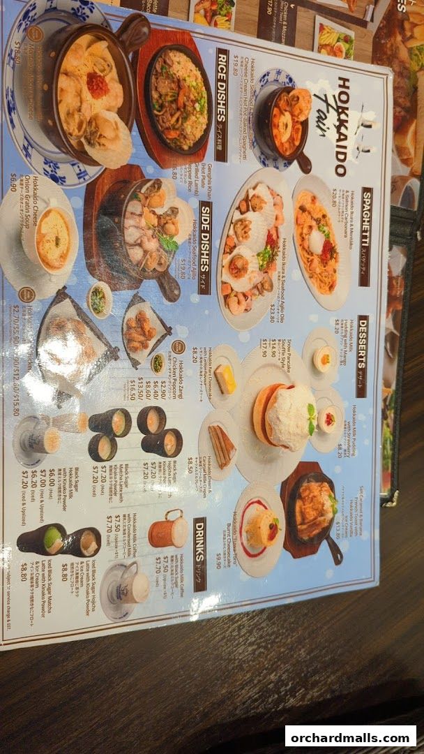 A menu from Hokkaido Fair featuring various Japanese dishes, desserts, and drinks.