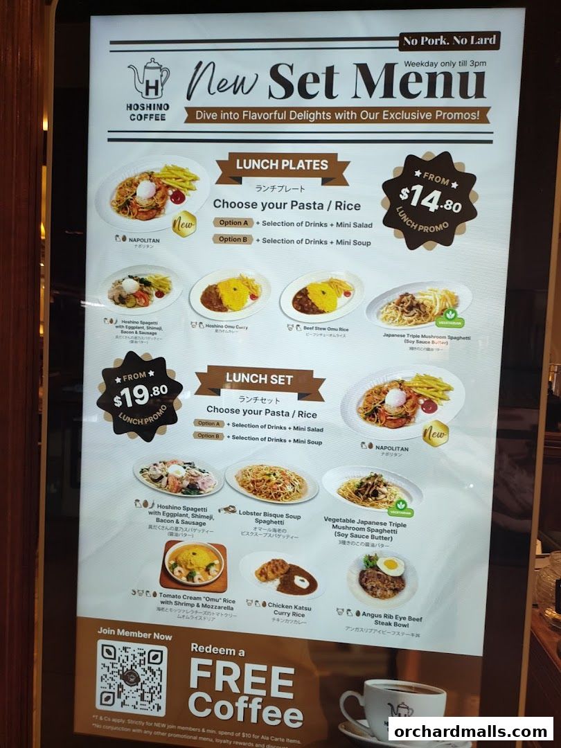 A digital menu board displaying Hoshino Coffee's new set lunch menu with various pasta and rice options.