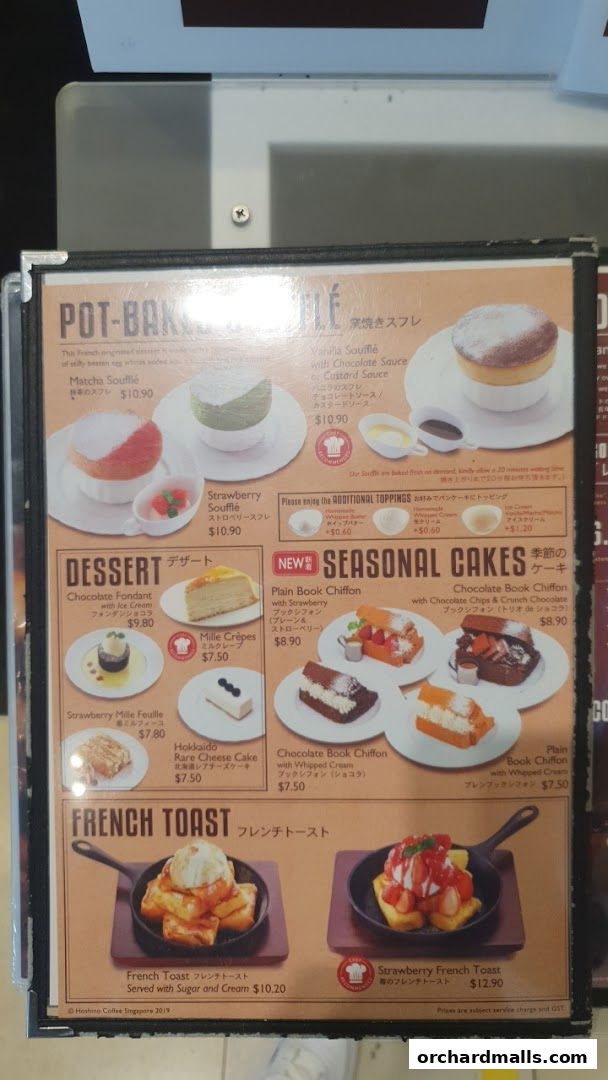 A menu featuring soufflés, desserts, seasonal cakes, and French toast with prices.