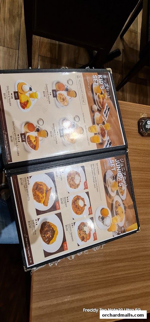 A menu from Hoshino Coffee featuring kids and junior sets with various meal options.