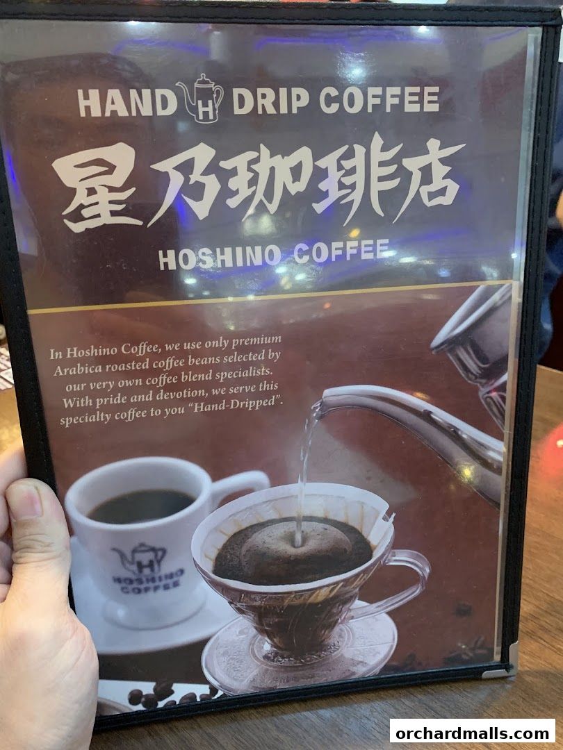 A menu showcasing Hoshino Coffee's hand-drip coffee with an image of coffee being brewed.