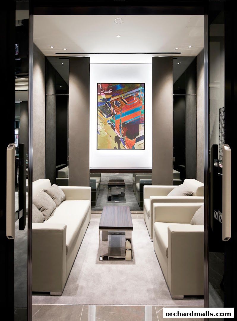 Luxurious interior of a boutique with modern seating and abstract art.