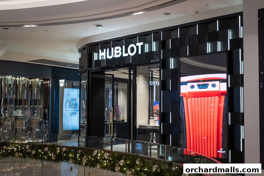 The Hublot Singapore ION Orchard Boutique features a modern facade with illuminated signage and digital displays.
