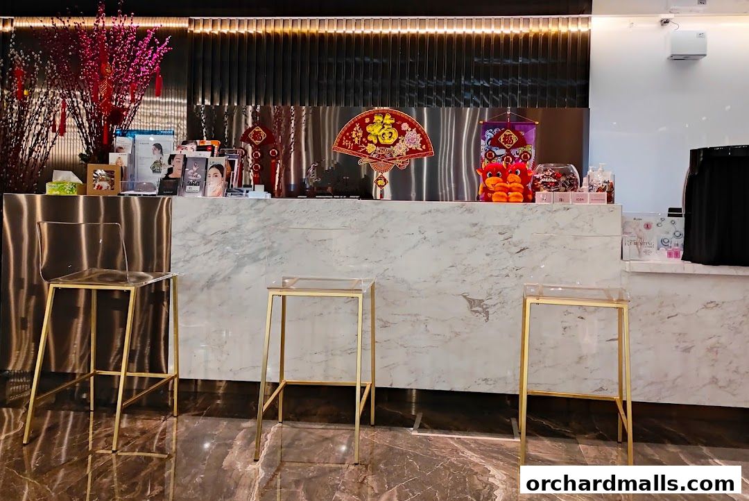 Reception area of a medical spa with decorative items and seating.