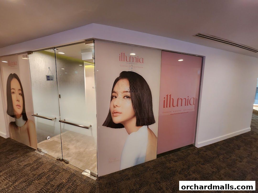 The entrance to Illumia Therapeutics, a medical spa, featuring large posters of a woman.