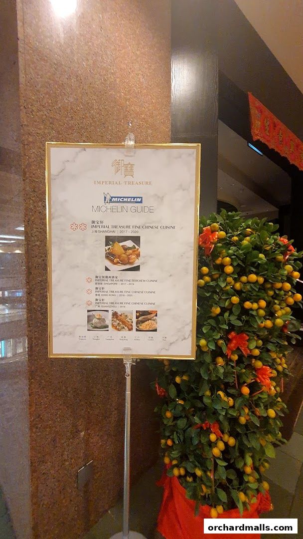 A sign displays Michelin Guide recognition for Imperial Treasure Fine Shanghai Cuisine.