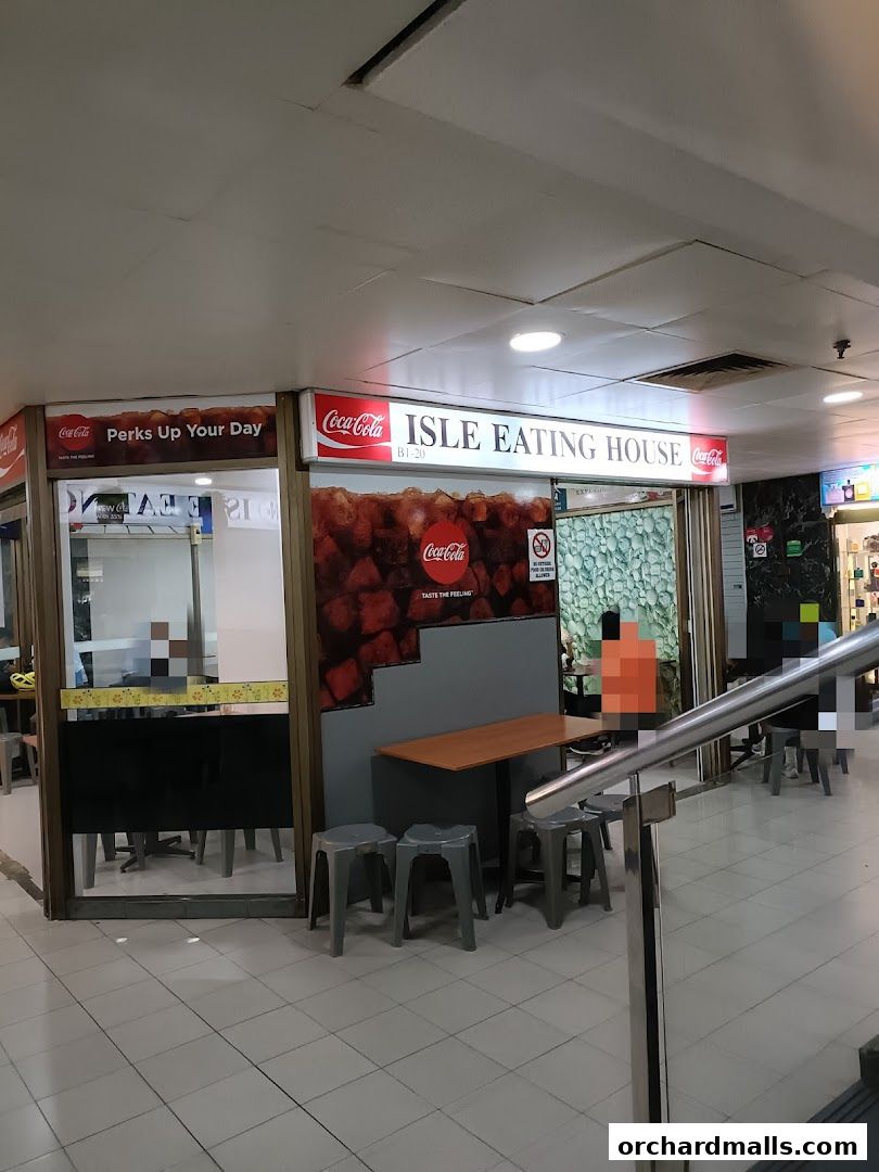 The exterior of Isle Eating House, a casual dining establishment with Coca-Cola branding.