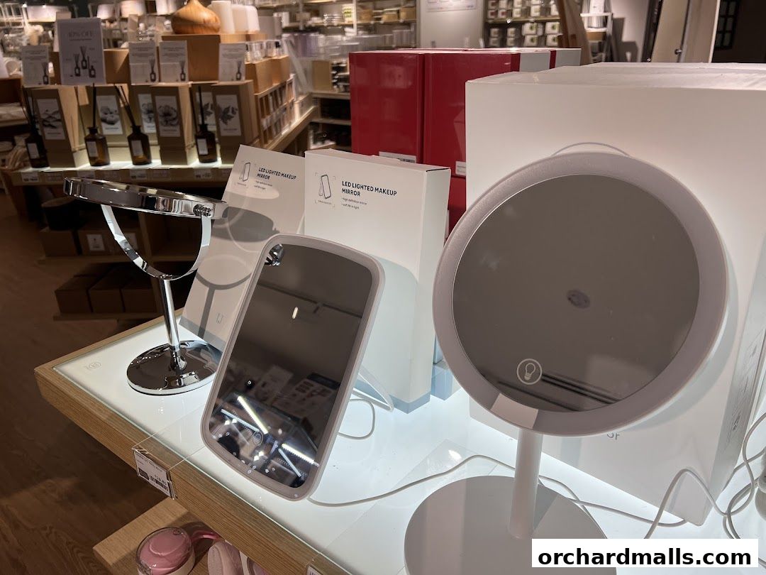 Display of LED makeup mirrors and other home goods in a retail store.
