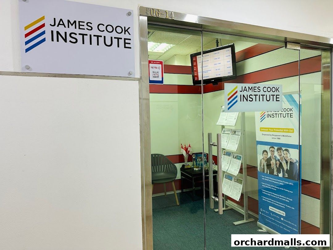 The entrance to James Cook Institute, featuring its logo and promotional banners.