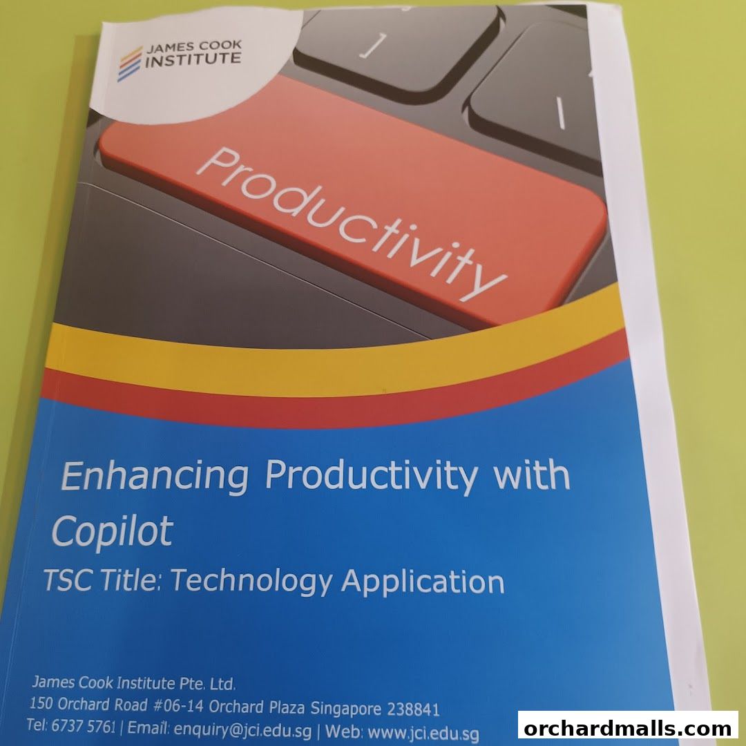 A brochure cover from James Cook Institute about enhancing productivity with Copilot.