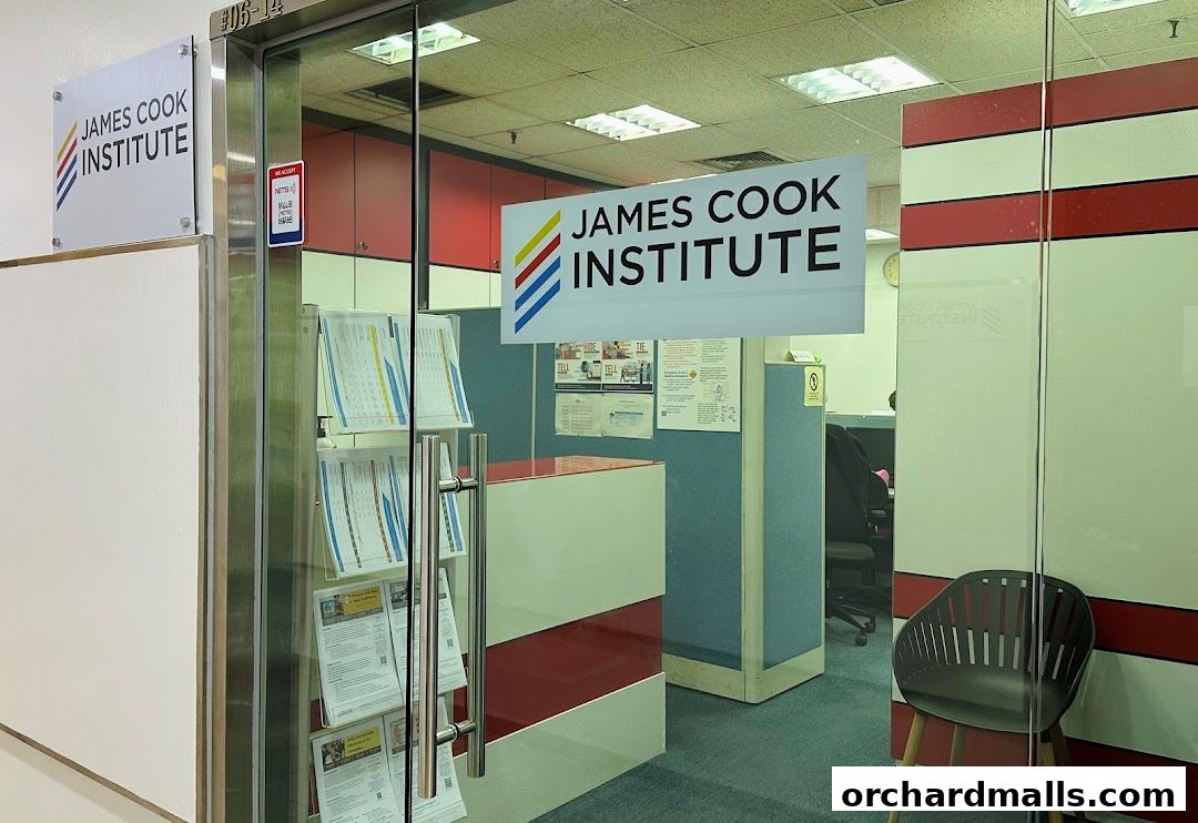 The entrance to James Cook Institute with signage and brochures displayed.