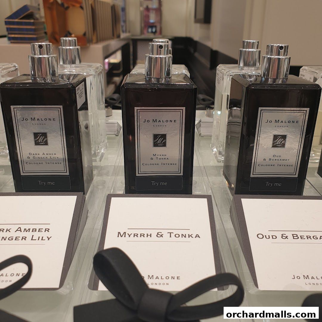 Jo Malone London cologne bottles displayed with scent names and 'Try me' tags.