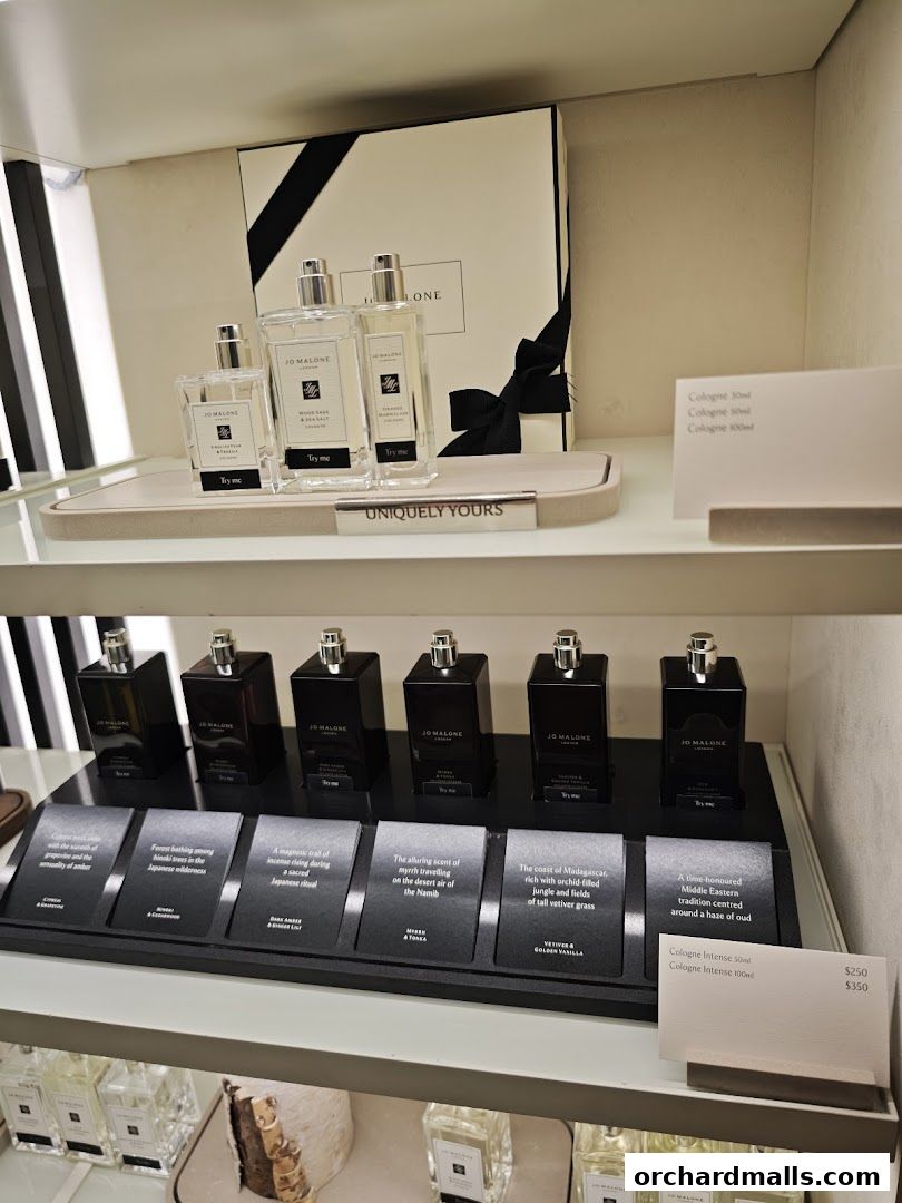 Jo Malone London display featuring various colognes and gift boxes.