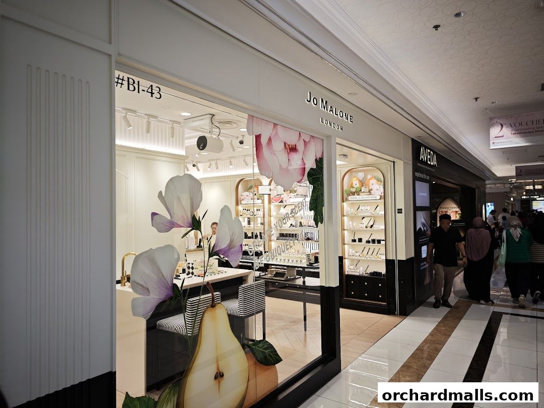 The Jo Malone London shop front with floral and fruit window displays.