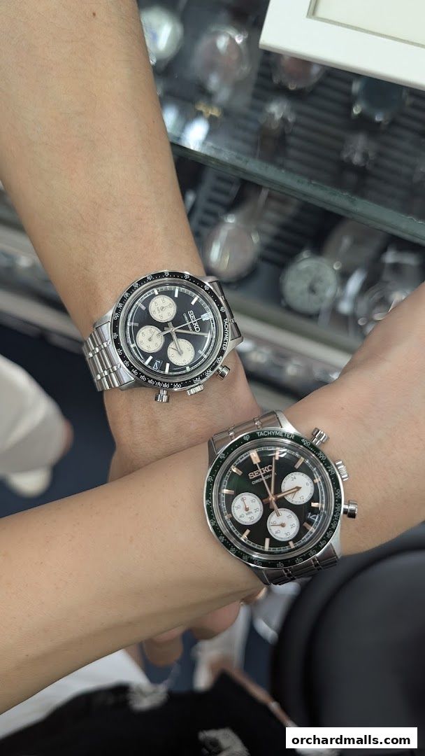 Two Seiko chronograph watches displayed on wrists, showcasing their intricate designs.