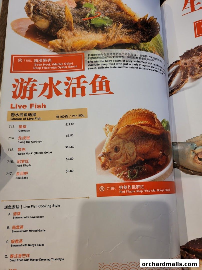 A menu page from JUMBO Seafood featuring live fish dishes and cooking styles.