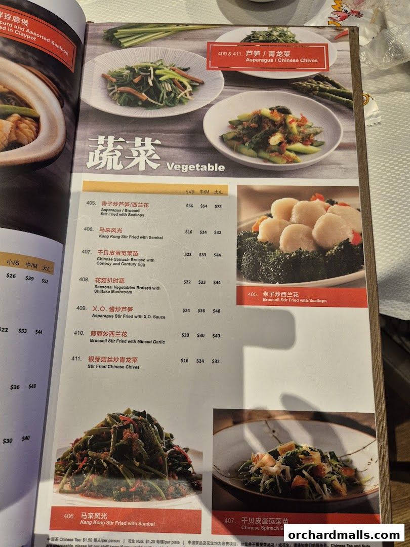 A menu page from JUMBO Seafood featuring various vegetable dishes with images and prices.