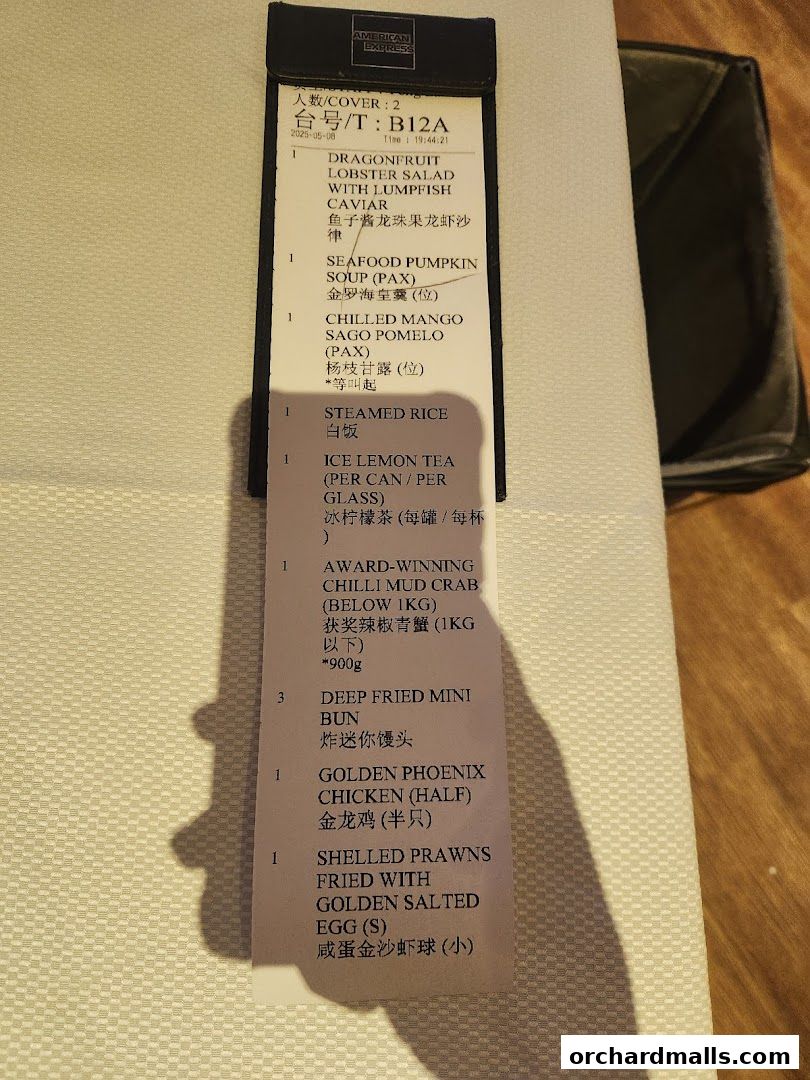 A close-up of a restaurant order slip with various Chinese and English food items listed.