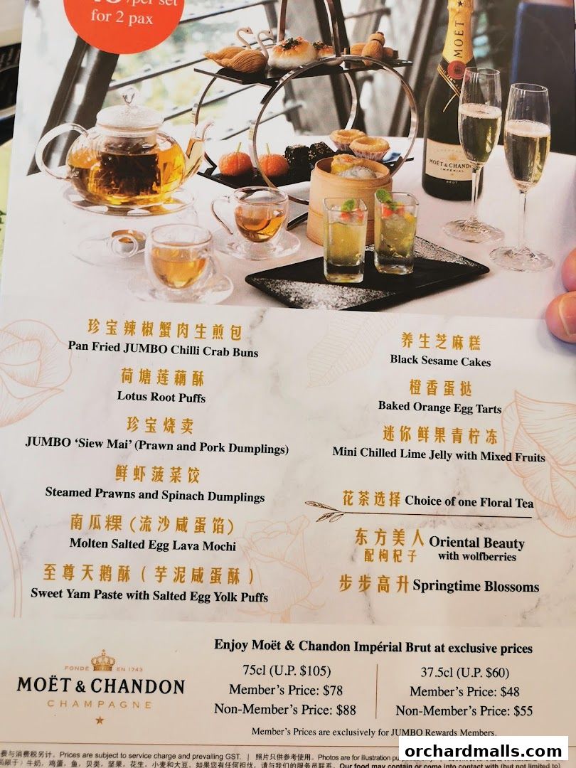 A menu featuring dim sum items and Moët & Chandon champagne with prices.