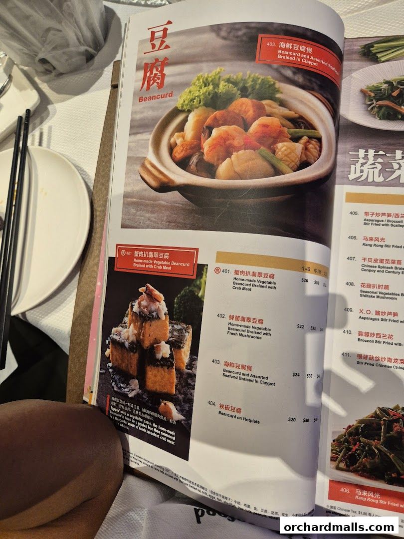A menu from JUMBO Seafood featuring various beancurd dishes with prices.