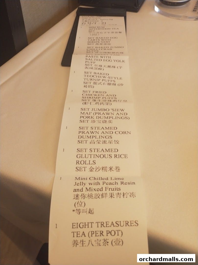 A close-up of a JUMBO Seafood menu featuring dim sum and tea options.