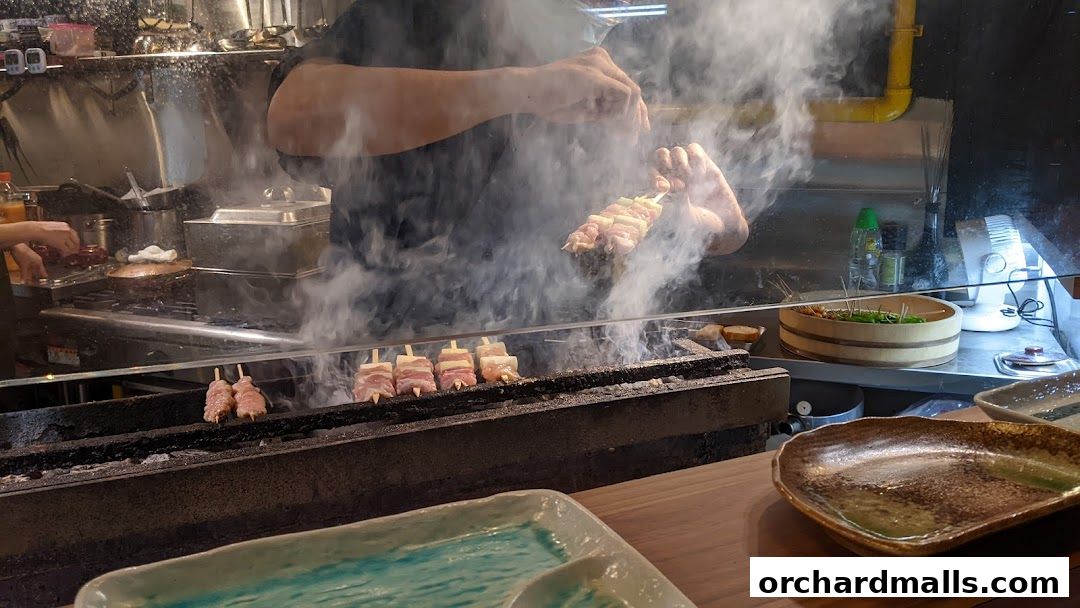 A chef grills skewers of meat and vegetables, with smoke rising from the grill.