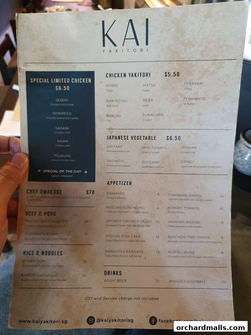 A menu from KAI Yakitori featuring various chicken, beef, pork, rice, noodle, appetizer, and drink options.