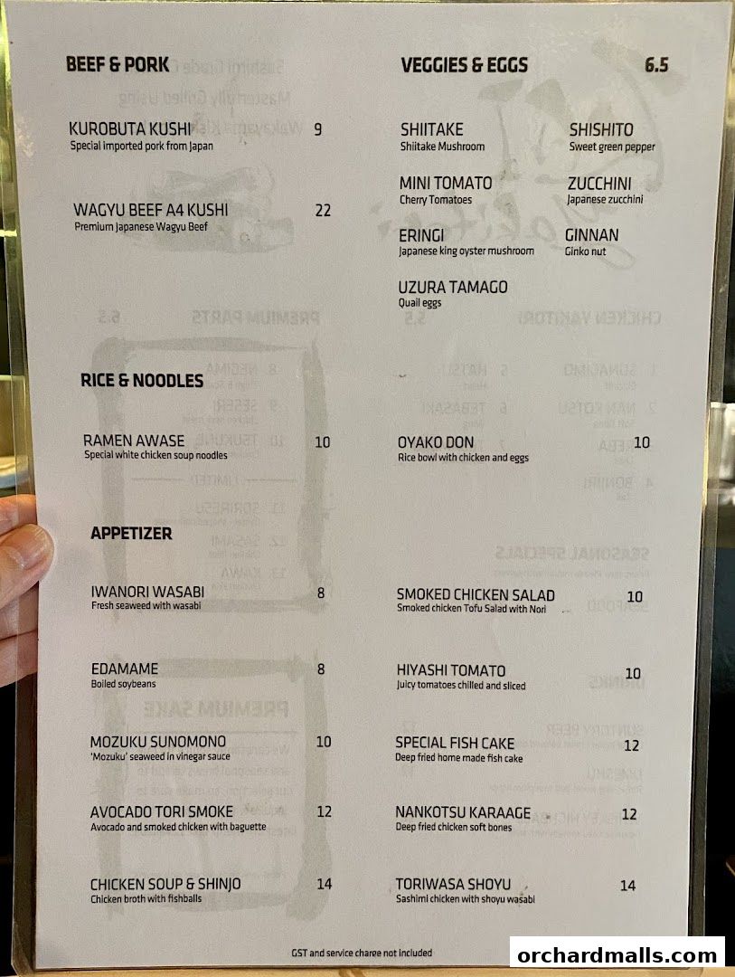A menu for KAI Yakitori featuring various Japanese dishes including beef, pork, vegetables, and noodles.
