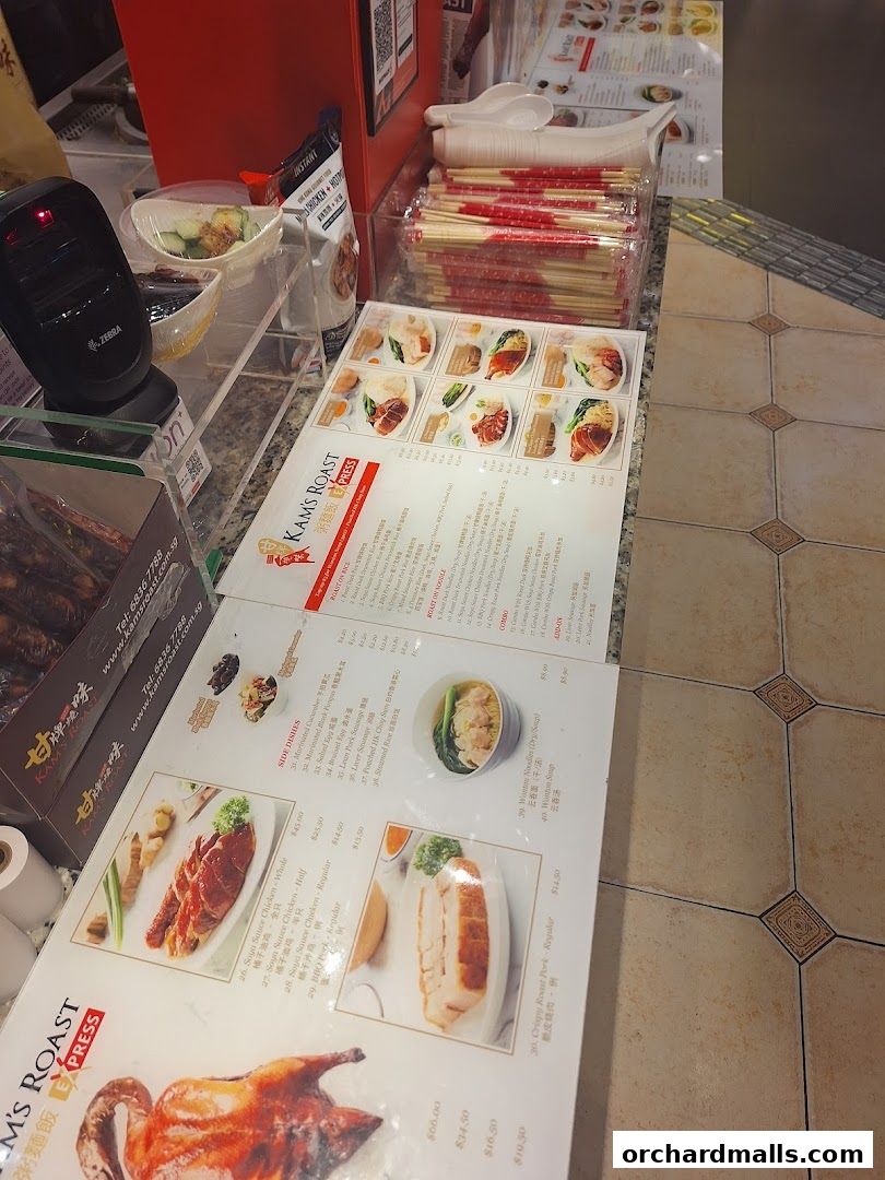 A menu from Kams Roast Express ION featuring various roast meats and side dishes.