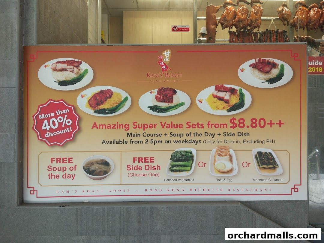 A promotional banner for Kam's Roast Express featuring roast meats and value set meals.