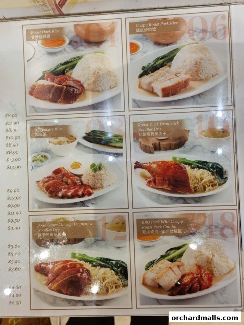 A menu display featuring various roast meats and noodle dishes with prices.