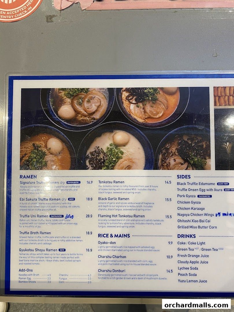 A menu showcasing various ramen dishes, sides, rice and mains, and drinks at Kanshoku Ramen Bar.